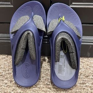 Oofos flip flops